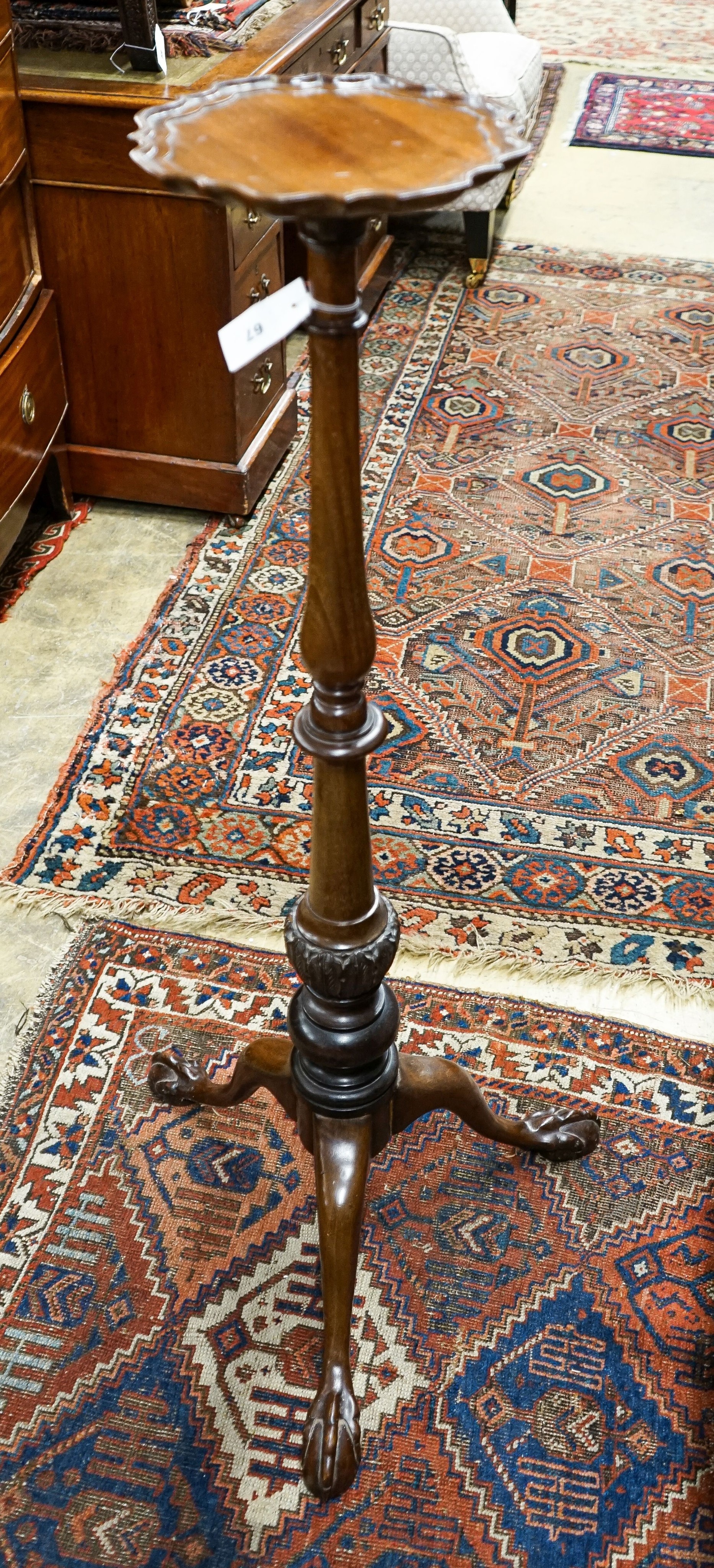 A Chippendale revival mahogany tripod torchere, height 113cm together with a Victorian mahogany toilet mirror